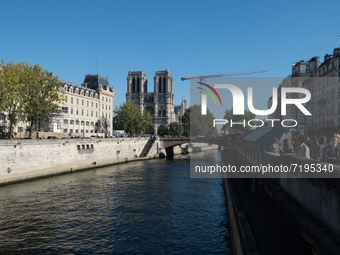 Conciergerie, Notre Dame And The Seine River In Paris