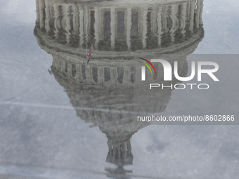 U.S. Capitol Reflected During Rain