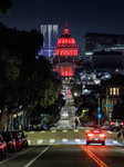 City Hall Is Illuminated In Red For World TB Day In San Francisco, Calif., On Sunday, March 24, 2024. 
