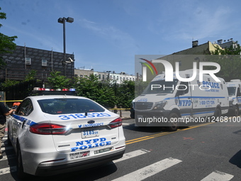 Multiple Vehicles Were Set On Fire In An Arson Attack In A Parking Lot With NYPD Vehicles On Myrtle Avenue And DeKalb Avenue
