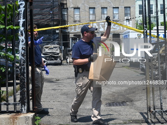 Multiple Vehicles Were Set On Fire In An Arson Attack In A Parking Lot With NYPD Vehicles On Myrtle Avenue And DeKalb Avenue