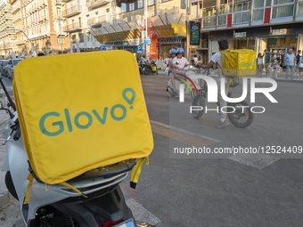 Glovo Couriers In Action On The Street