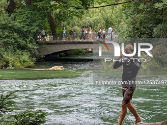 Young Diver In Stream