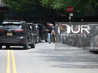 Members Of The United States Marshal Service Regional Fugitive Task Force Gather At The Scene Following The Arrest Of A 62-year-old Man Identified As Audwin Caines On West 142nd Street