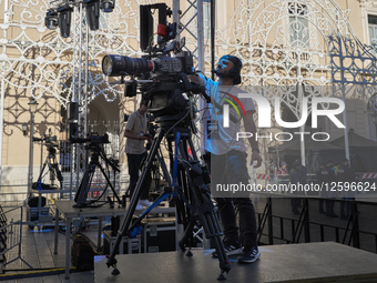 TV Cameraman Prepares For Live Broadcast