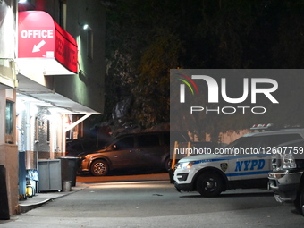 NYPD Police Officers Maintain A High Police Presence And Guard The Scene Where A 60-year-old Man Was Found Dead After Sustaining Trauma To The Head Inside Of A Motel Room At The Deegan Motel Within The Confines Of The 50 Precinct