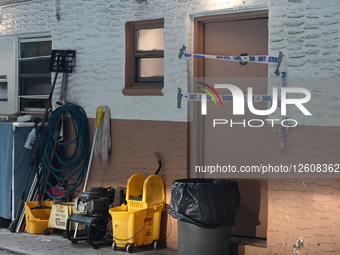 NYPD Police Officers Maintain A High Police Presence And Guard The Scene Where A 60-year-old Man Was Found Dead After Sustaining Trauma To The Head Inside Of A Motel Room At The Deegan Motel Within The Confines Of The 50 Precinct
