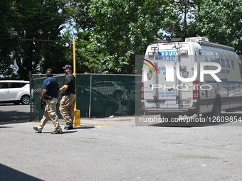 NYPD Police Officers Maintain A High Police Presence And Guard The Scene Where A 60-year-old Man Was Found Dead After Sustaining Trauma To The Head Inside Of A Motel Room At The Deegan Motel Within The Confines Of The 50 Precinct