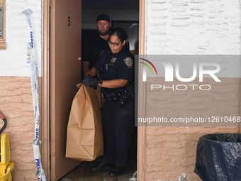NYPD Police Officers Maintain A High Police Presence And Guard The Scene Where A 60-year-old Man Was Found Dead After Sustaining Trauma To The Head Inside Of A Motel Room At The Deegan Motel Within The Confines Of The 50 Precinct
