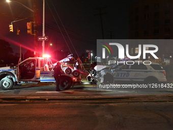 Two NYPD Police Vehicles Collided As They Were Responding To A Crime In Progress And As A Result Were Heavily Damaged At Beach 34th Street And Seagirt Boulevard