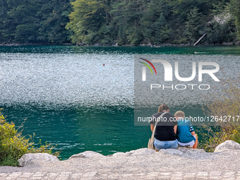 Mother And Child At Lake