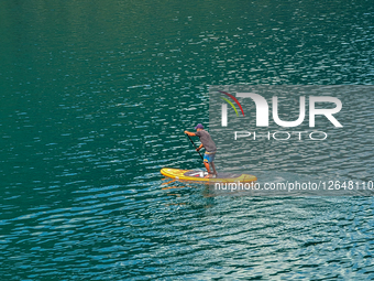 Stand Up Paddling In Tyrol At Lake Plansee In Summer