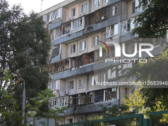 Multi-story residential building damaged in Berezniaky neighborhood as result of Russian aerial strike.