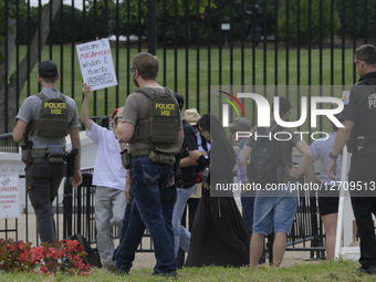 DC: HSI Special Agents hold a White House walking around 