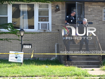 Chicago Police Officers Work The Scene Where A 2-year-old Boy Fatally Shot Himself In The Face Inside Of A Residence On The 300 Block Of E. 87th Street