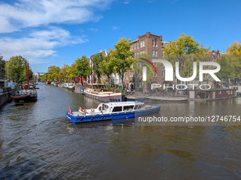 Police Boat Patrol In Amsterdam