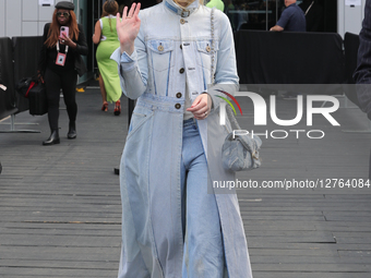 Elle Fanning Attends Coach Show At New York Fashion Week