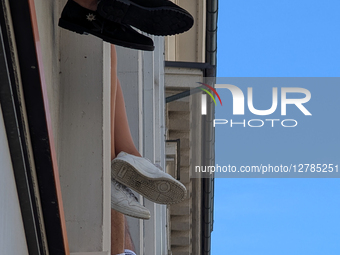 Feet And Shoes At Windows