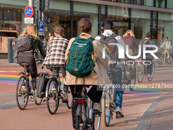 Cycling Traffic On Rainbow Crosswalk