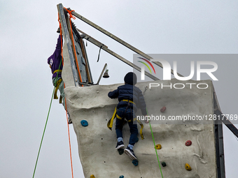 Children Climbing Wall