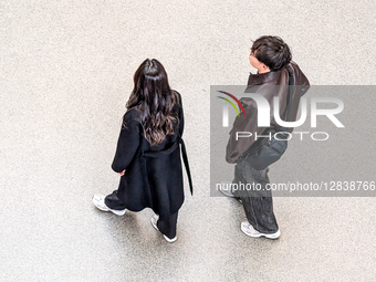 Young Couple Walking Indoor