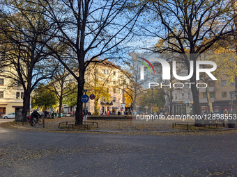 People Enjoy Autumn Afternoon At Pariser Platz In Munich