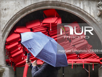 Woman Taking Pictures With Smartphone During Rain