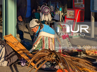 Street Musician Preparing Instruments