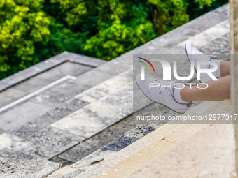 Relaxing On Stone Steps