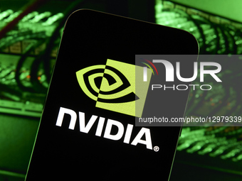 NVIDIA Logo Displayed On Smartphone With GeForce GPU Cooling Fan