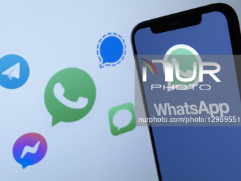 WhatsApp Logo Displayed On A Smartphone With Other Messaging App Icons In The Background