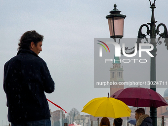 Man Alone In Venice In Rain