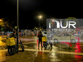 Glovo Couriers Near Arezzo Train Station At Night