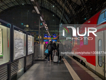 Passengers And Trains On A Platform At Frankfurt Am Main Central Station