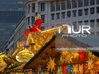 Christmas Market Stall Decorated With Lights, Stars, And Santa In Frankfurt