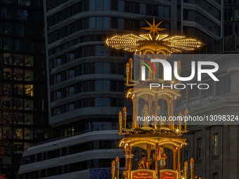 Traditional German Christmas Pyramid Decoration In Frankfurt City Center At Night
