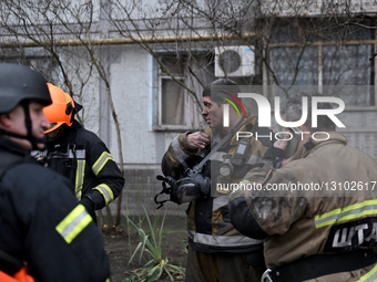 Russian drone hits apartment block in Zaporizhzhia.