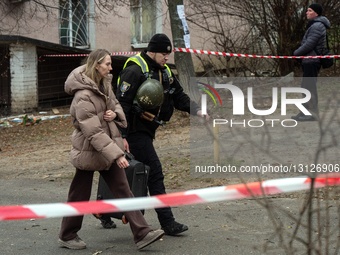 Russian drone debris falls on apartment block in Kyiv.