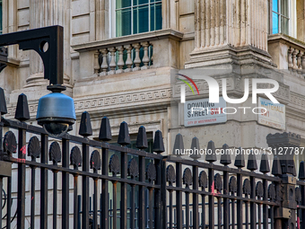 Street Signage At The Gated Entrance Of Downing Street In London