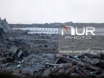 Displaced Palestinians Shelter Amid Destruction In Central Gaza