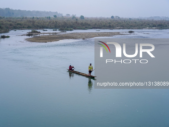 Tourists Are Crossing The Rapti River By Boat In Sauraha, Chitwan, Nepal