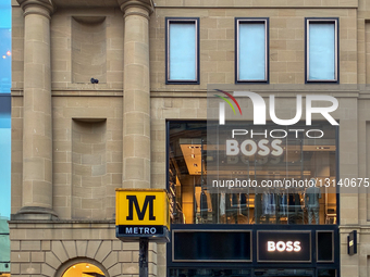 Hugo Boss Store Facade And Monument Metro Station Signage