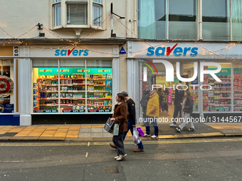 Savers Health And Beauty Storefront And Shoppers On A City Street In York