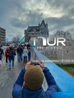 Tourists On Tower Bridge In London