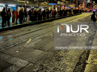 Evening Rush Hour At A Busy Edinburgh Tram Stop