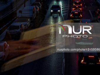 Reading Passenger In Train And Night Street Traffic In Munich