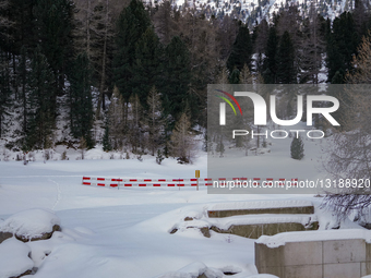 Snow Covered Railway Infrastructure At Bernina Suot Station In The Swiss Alps