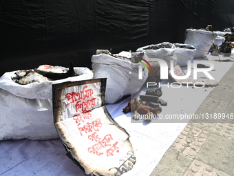 Cultural Organization Udichi ShilpiGosthi Held An Exhibition Of Cultural Materials Destroyed In The Attack And Arson Attack In Dhaka.