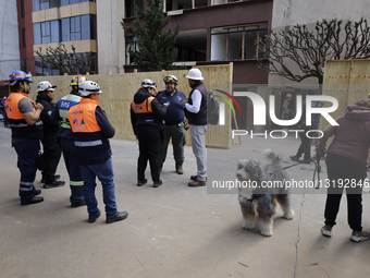 Families Remove Furniture And Belongings From Damaged Building In Paseos De Taxqueña, Mexico City