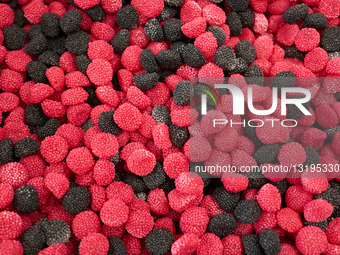 Blue Spiral Gummy Candies Displayed At A Market